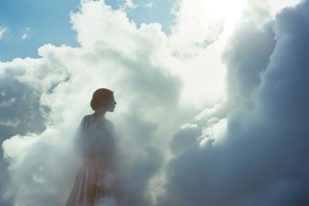 A woman lost in the clouds.